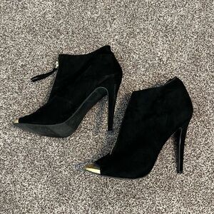 Mossimo Supply Co Black Heeled Boots with Elegant Silhouette